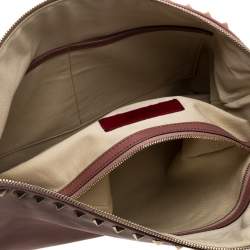 مملوكة مسبقًا حقيبة صغيرة فالنتينو حجم كبير مرصعة روكستد و حمالة معصم جلد وردي داكن