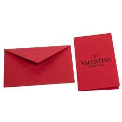 Pre Owned حقيبة كلتش فالنتينو روكستد جلد بيج بحمالة معصم