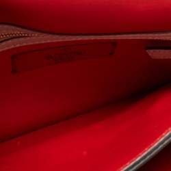 مملوكة مسبقًا Valentino Beige Leather Rockstud Wristlet Clutch