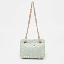 Pre Owned Valentino Light Blue Quilted Coated Fabric Small Rockstud Spike Top Handle Bag