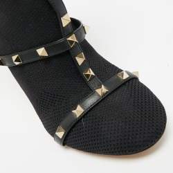 مملوكة مسبقًا حذاء بوت فالتينينو نسيج محبوك وجلد أسود طول الكاحل بحلي معدنية مقاس 39