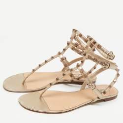 Pre Owned صندل فلات سير تي روكستد جلد ذهبي فالنتينو مقاس 41