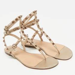 Pre Owned صندل فلات سير تي روكستد جلد ذهبي فالنتينو مقاس 41