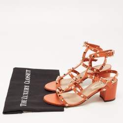 Pre Owned Valentino Orange Leather Rockstud Ankle Strap Sandals Size 36.5