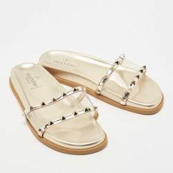 Pre Owned Valentino Gold Leather and PVC Rockstud Flat Slides Size 39