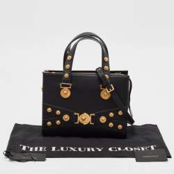 مملوكة مسبقًا حقيبة يد توتس فيرساتشي تريبوت ميدوسا جلد أسود مزخرفة