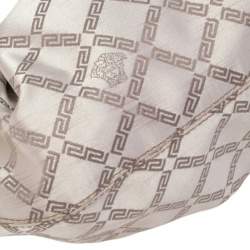 مملوكة مسبقًا حقيبة هوبو فيرساتشي جلد وكانفاس مونوغرامي ذهبي بالشعار