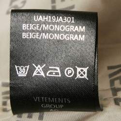 Pre Owned Vetements Beige Logo Print Shell Raincoat One Size