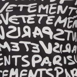 Pre Owned Vetements Monochrome All Over Logo Print Jersey One Shoulder Top S