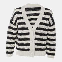 مملوكة مسبقًا ```json
{"name": "Weekend Max Mara Navy Blue & Cream Patterned Crochet Knit Oversized Cardigan M", "name_ar": "كارديجان ويكند ماكس مارا محبوك كروشيه بلون أزرق داكن وكريمي بتصميم منقوش مقاس متوسط"}
```