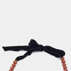 Pre Owned Yves Saint Laurent Wood Beads and Velvet Bow Long Necklace