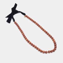 Pre Owned Yves Saint Laurent Wood Beads and Velvet Bow Long Necklace