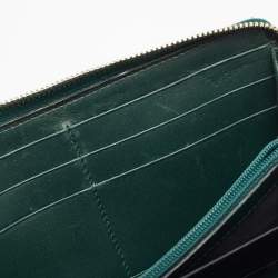 Pre Owned Yves Saint Laurent Green Patnet Leather Belle De Jour Zip Continental Wallet