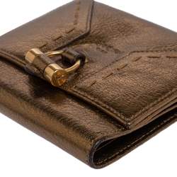 Pre Owned محفظة ايف سان لوران موس جلد ذهبي ميتاليك مضغوظة