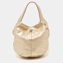 Pre Owned حقيبة هوبو إيف سان لوران جلد ذهبي