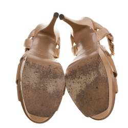 Pre Owned صندل سان لوران باريس نعل سميك تريبيوت جلد بيج لامع مقاس 38.5