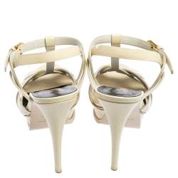 Pre Owned صندل إيف سان لوران باريس تريبيوت جلد كريمي لامع مقاس 37.5