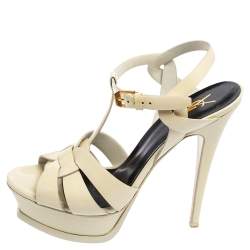 Pre Owned صندل إيف سان لوران باريس تريبيوت جلد كريمي لامع مقاس 37.5