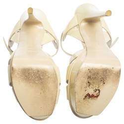 Pre Owned صندل إيف سان لوران باريس تريبيوت جلد كريمي لامع مقاس 37.5