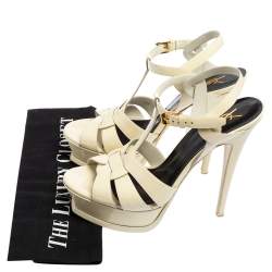 Pre Owned صندل إيف سان لوران باريس تريبيوت جلد كريمي لامع مقاس 37.5