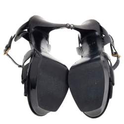 Pre Owned صندل أيف سان لوران سير كاحل نعل سميك تريبيوت جلد لامع أسود مقاس 40