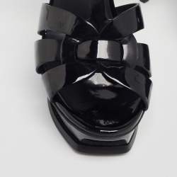 Pre Owned صندل إيف سان لوران تريبوت جلد أسود لامع بحزام للكاحل نعل سميك مقاس 37.5