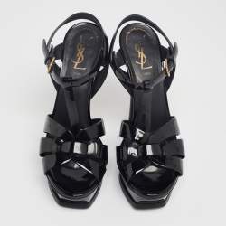 Pre Owned صندل إيف سان لوران تريبوت جلد أسود لامع بحزام للكاحل نعل سميك مقا س 37.5