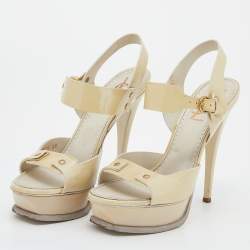 Pre Owned صندل إيف سان لوران جلد كريمي لامع نعل سميك بحزام للكاحل مقاس 38