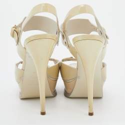 Pre Owned صندل إيف سان لوران جلد كريمي لامع نعل سميك بحزام للكاحل مقاس 38