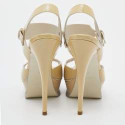 Pre Owned صندل إيف سان لوران جلد لامع كريمي نعل سميك سير كاحل مقاس 38