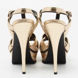 مملوكة مسبقًا صندل إيف سان لوران تربيوت جلد نقشة السحلية ذهبي ميتاليك بحزام للكاحل نعل سميك مقاس 39