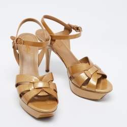 Pre Owned صندل إيف سان لوران تربيوت جلد ذهبي لامع نعل سميك مقاس 39.5