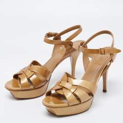 Pre Owned صندل إيف سان لوران تربيوت جلد ذهبي لامع نعل سميك مقاس 39.5