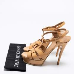 Pre Owned صندل إيف سان لوران تربيوت جلد بيج لامع نعل سميك مقاس 39.5