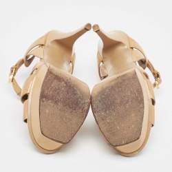 Pre Owned صندل إيف سان لوران تربيوت جلد بيج لامع نعل سميك مقاس 39.5