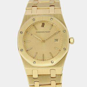 Pre Owned Audemars Piguet Royal Oak 56175BA.OO.0789BA.02 Quartz Champagne 18k Yellow Gold Men's Wristwatch 33 mm