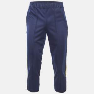 {"name": "Comme des Garçons Shirt Blue Jersey Striped Track Pants S", "name_ar": "كوم دي غارسونز شيرت بنطلون رمادي مقلم من جيرسي صغير"}