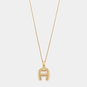 Aigner Crystal Gold Tone Pendant Necklace
