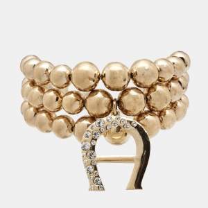 Aigner Bedazzled Gold Plated Crystal Logo Bracelet