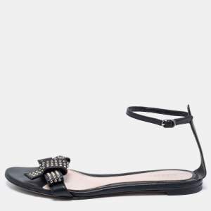 Pre Owned Alexander McQueen Black Leather Eyelet Embellished Bow Flat Ankle Strap Sandals Size 40