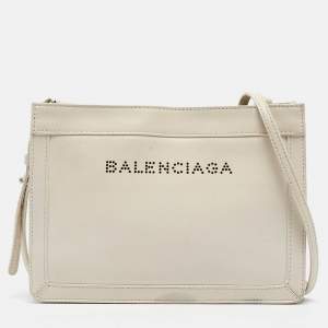 Pre Owned Balenciaga Off White Leather Perforated Logo Pochette Bag