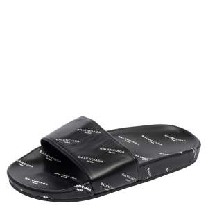 Pre Owned Balenciaga Black All-Over Logo Stamped Leather Flat Slides Size 38