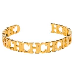 Pre Owned Carolina Herrera Gold Tone Between the Line Open Cuff Bracelet