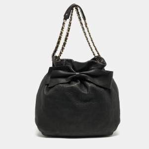 مملوكة مسبقًا Carolina Herrera Bow Black Monogram Embossed Leather Bucket Bag