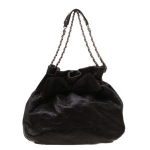 Pre Owned Carolina Herrera Dark Brown Monogram Embossed Leather Bow Bucket Shoulder Bag