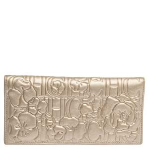 Pre Owned Carolina Herrera Metallic Gold Floral Embossed Leather Bifold Continental Wallet