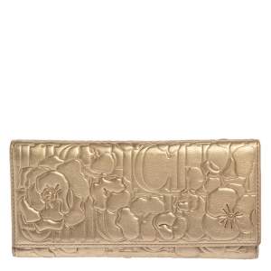 Pre Owned Carolina Herrera Gold Floral Embossed Leather Trifold Continental Wallet