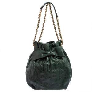 Pre Owned Carolina Herrera Dark Green Monogram Embossed Leather Bow Bucket Shoulder Bag