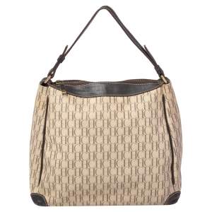 Pre Owned Carolina Herrera Brown/Beige Monogram Canvas and Leather Hobo