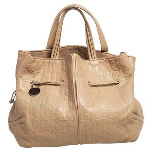 Pre Owned Carolina Herrera Beige Monogram Embossed Leather Drawstring Tote